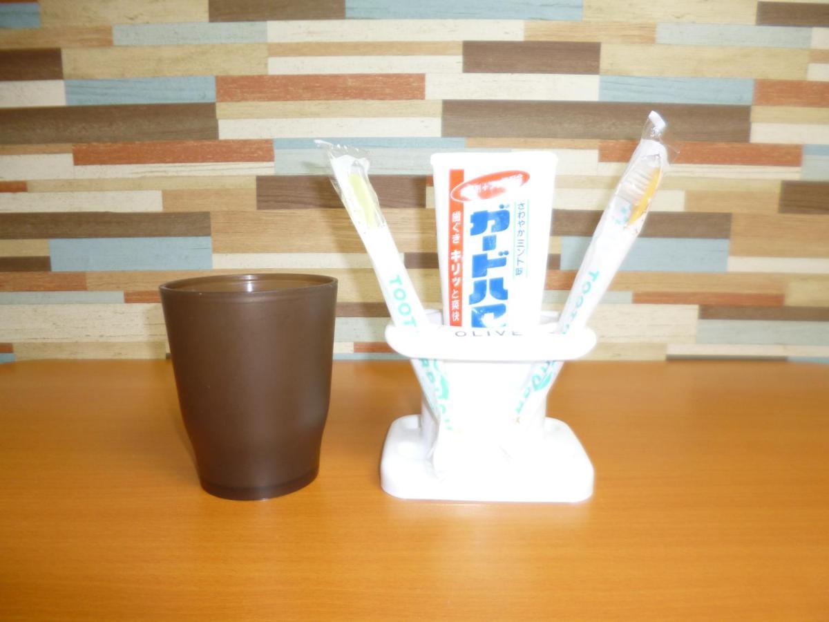 Appartamento ザミッキーカールトン井尻102 Shiobaru Esterno foto
