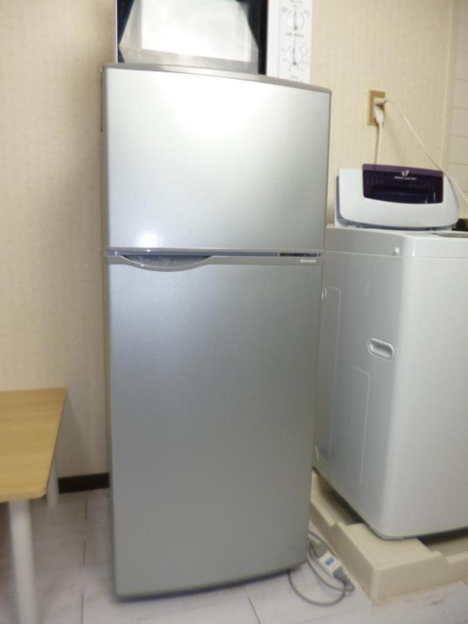 Appartamento ザミッキーカールトン井尻102 Shiobaru Esterno foto