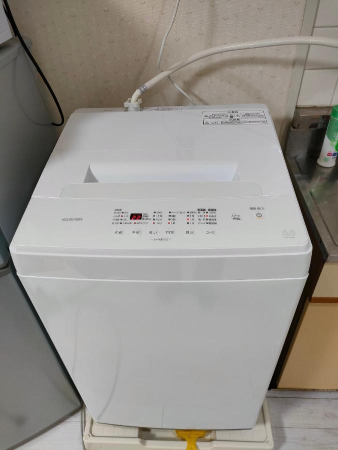 Appartamento ザミッキーカールトン井尻102 Shiobaru Esterno foto